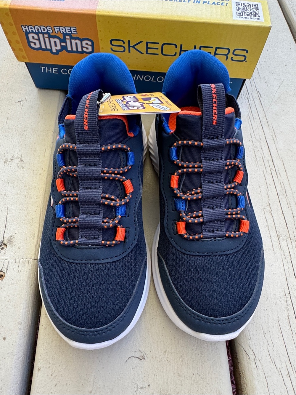 Skechers Kids Navy Slip-On Sneakers with Orange and Blue Accents - Picture 3 of 6